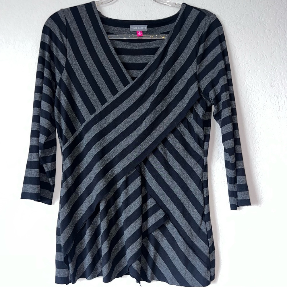 Vince Camuto striped tunic with asymmetrical cutouts. Gray color Size M